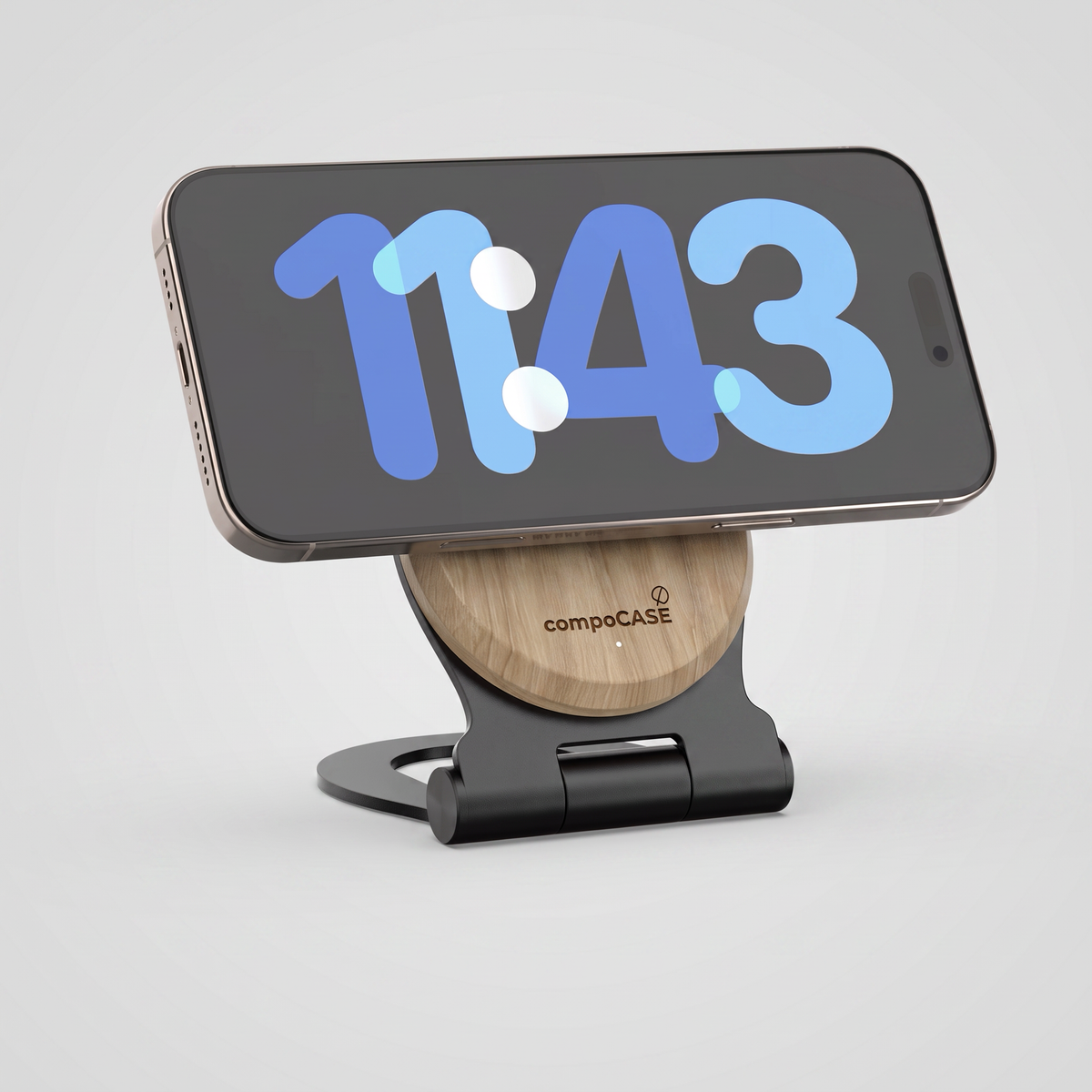 iPhone im Querformat auf der magnetischen Holz-Ladestation Single Pro